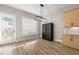 Bright breakfast area with light wood cabinets and vinyl flooring at 1358 Pavilion Se Ct, Atlanta, GA 30316