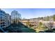 Spacious balcony overlooks a well-maintained courtyard and nearby residential buildings at 1800 Clairmont Lk # 413, Decatur, GA 30033
