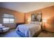 Comfortable bedroom with large windows and artistic decor on the wall at 1800 Clairmont Lk # 413, Decatur, GA 30033