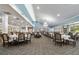 Large dining room with multiple tables, ideal for social events and communal dining at 1800 Clairmont Lk # 413, Decatur, GA 30033