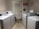 Community laundry room with multiple washers and dryers for residents' convenience at 1800 Clairmont Lk # 413, Decatur, GA 30033