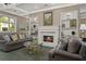 Cozy living room with fireplace, built-in shelving and lots of natural light at 1800 Clairmont Lk # 413, Decatur, GA 30033