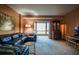 Open living room with natural light from the window and antique display cabinet at 1800 Clairmont Lk # 413, Decatur, GA 30033