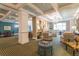 Open living space with a fireplace, plush seating, and natural light at 1800 Clairmont Lk # 413, Decatur, GA 30033