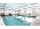 Indoor swimming pool with lap lanes, comfortable seating, and natural light at 1800 Clairmont Lk # 413, Decatur, GA 30033