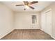 Comfortable carpeted bedroom with a ceiling fan, window, and closet at 2791 Ponderosa Cir, Decatur, GA 30033