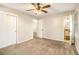Spacious carpeted bedroom with an attached bathroom and double door closet at 2791 Ponderosa Cir, Decatur, GA 30033