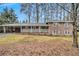 Brick ranch house with carport, covered porch, and landscaped yard at 2791 Ponderosa Cir, Decatur, GA 30033