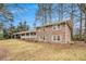 Ranch house with brick exterior, covered porch, and mature trees at 2791 Ponderosa Cir, Decatur, GA 30033