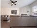Living room with hardwood floors, fireplace, and large TV at 413 Delancy Dr, Woodstock, GA 30189