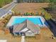 Community pool and clubhouse with plenty of green space at 413 Delancy Dr, Woodstock, GA 30189