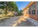 Backyard with shed and partial fence, showing some landscaping at 551 Garden View Ct, Lawrenceville, GA 30046