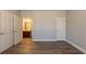 Bright bedroom with hardwood floors and access to bathroom at 551 Garden View Ct, Lawrenceville, GA 30046