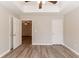 Bright bedroom with ceiling fan and access to another room at 551 Garden View Ct, Lawrenceville, GA 30046