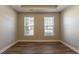 Spacious bedroom with hardwood floors and large windows at 551 Garden View Ct, Lawrenceville, GA 30046