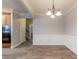 Spacious dining area with hardwood floors and chandelier at 551 Garden View Ct, Lawrenceville, GA 30046