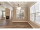 Bright dining room with hardwood floors and large windows at 551 Garden View Ct, Lawrenceville, GA 30046