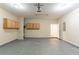 Spacious garage with overhead storage and access to the house at 551 Garden View Ct, Lawrenceville, GA 30046