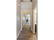 Bright hallway with hardwood floors leading to living room and bedrooms at 551 Garden View Ct, Lawrenceville, GA 30046