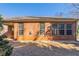 Brick house exterior with backyard and landscaping at 551 Garden View Ct, Lawrenceville, GA 30046