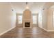 Spacious living room with hardwood floors and a fireplace at 551 Garden View Ct, Lawrenceville, GA 30046