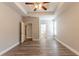 Large main bedroom with hardwood floors and access to bathroom at 551 Garden View Ct, Lawrenceville, GA 30046