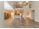 Open floor plan with kitchen, living room, and loft area at 551 Garden View Ct, Lawrenceville, GA 30046