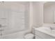 Clean bathroom with tub shower, toilet and vanity at 1029 Blue Juniper Cir, Loganville, GA 30052