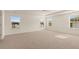 Spacious bedroom with carpet and multiple windows at 1029 Blue Juniper Cir, Loganville, GA 30052