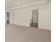 Primary bedroom with access to bathroom and carpet flooring at 1029 Blue Juniper Cir, Loganville, GA 30052