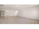 Bright bonus room featuring carpet, a bathroom, and closet at 1029 Blue Juniper Cir, Loganville, GA 30052