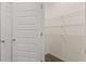 Bright walk-in pantry with wire shelving at 1029 Blue Juniper Cir, Loganville, GA 30052