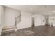 Elegant carpeted staircase with metal railing at 1029 Blue Juniper Cir, Loganville, GA 30052