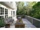 Spacious deck with wooded views, furnished for relaxing at 1240 Falls Creek Ct, Conyers, GA 30094