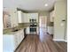 Kitchen with stainless steel appliances and light cabinets at 1240 Falls Creek Ct, Conyers, GA 30094