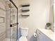 Modern bathroom with a frameless shower and updated vanity at 4485 Spring Valley Pkwy, Atlanta, GA 30349