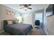 Bright bedroom with queen bed, desk, and large closet at 4485 Spring Valley Pkwy, Atlanta, GA 30349