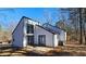 House exterior featuring a newly renovated exterior and patio at 4485 Spring Valley Pkwy, Atlanta, GA 30349