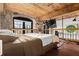 Spacious loft bedroom with exposed beams and large window at 170 Boulevard Se # H-221, Atlanta, GA 30312
