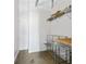 Small laundry room with metal shelving and countertop at 170 Boulevard Se # H-221, Atlanta, GA 30312