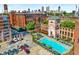 Community pool with plenty of lounge chairs at 170 Boulevard Se # H-221, Atlanta, GA 30312