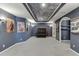 Basement home theater with dark blue walls and star ceiling at 2555 Lynshire Ln, Snellville, GA 30078