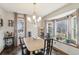 Bright dining room with bay window and chandelier at 2653 Forest Ne Way, Marietta, GA 30066