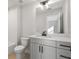 Bathroom with shower/tub combo, vanity, and white tile at 2615 Yellowstone Farm Dr, Cumming, GA 30028
