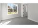 Bright bedroom with a large window and plush carpeting at 2615 Yellowstone Farm Dr, Cumming, GA 30028