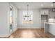 Dining room with hardwood floors, access to back yard and kitchen at 2615 Yellowstone Farm Dr, Cumming, GA 30028