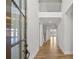 Bright and spacious foyer with a wooden staircase and hardwood floors at 2615 Yellowstone Farm Dr, Cumming, GA 30028