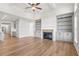 Open Gathering room with hardwood floors and built-in shelving at 2615 Yellowstone Farm Dr, Cumming, GA 30028