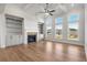 Spacious Gathering room with built-in shelving and fireplace at 2615 Yellowstone Farm Dr, Cumming, GA 30028
