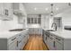 Modern kitchen with gray cabinets, quartz countertops and stainless steel appliances at 2615 Yellowstone Farm Dr, Cumming, GA 30028